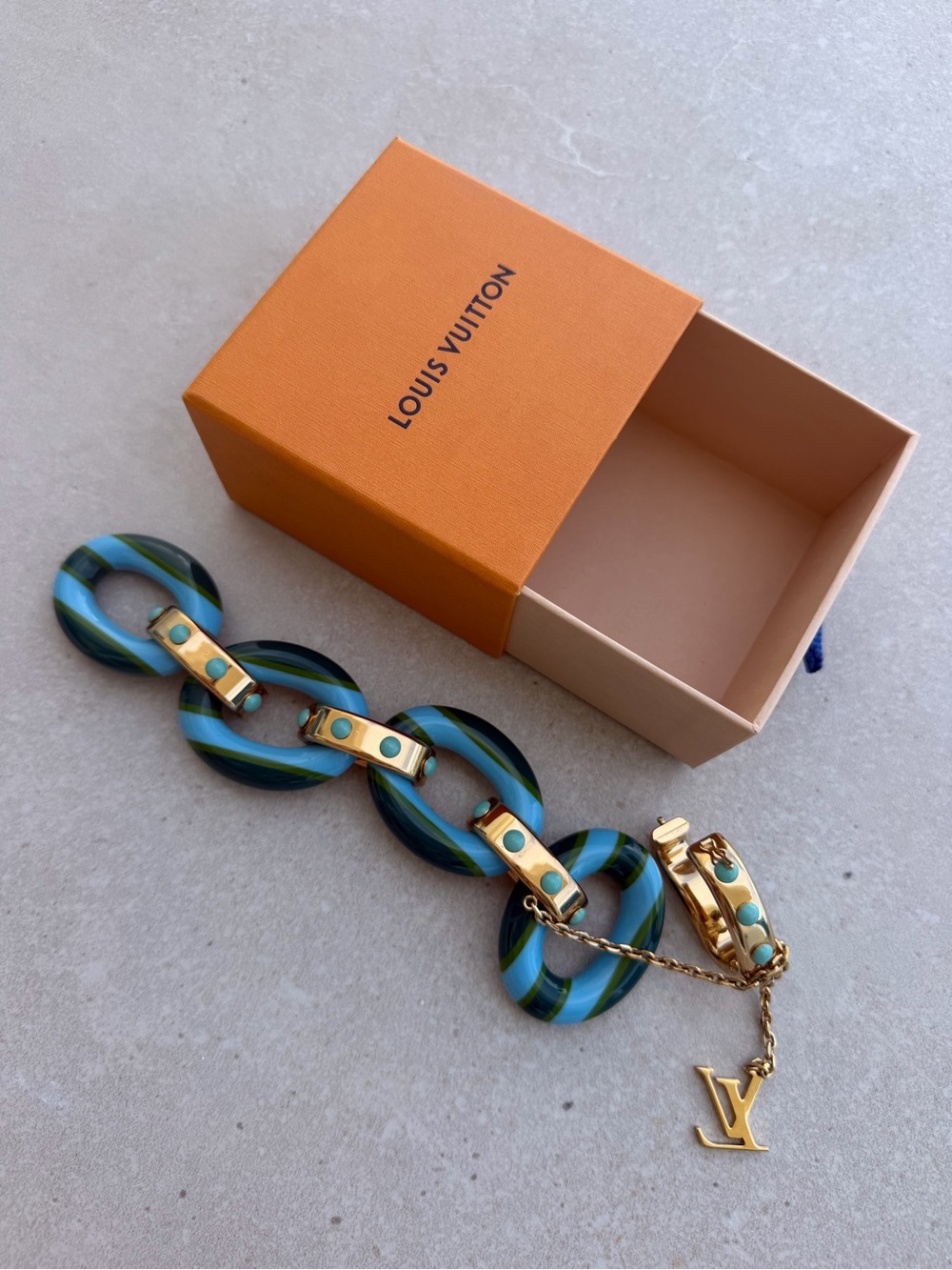 Louis Vuitton Blue and Turquoise Striped Resin Bracelet with Gold LV Charm - Picture 6 of 13